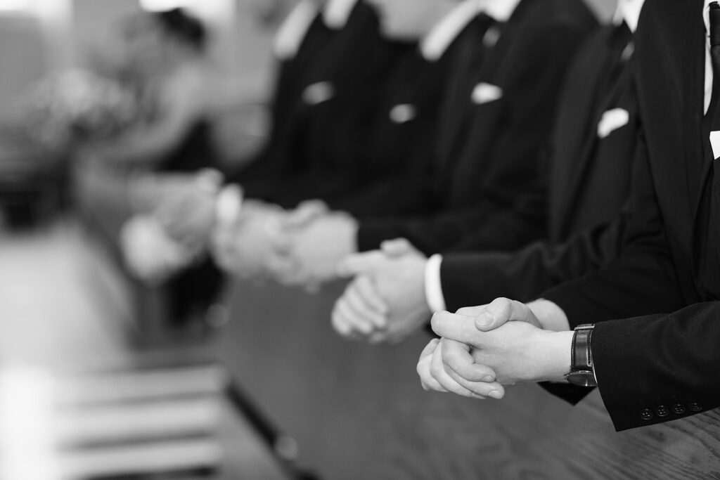 Mens hands in a church